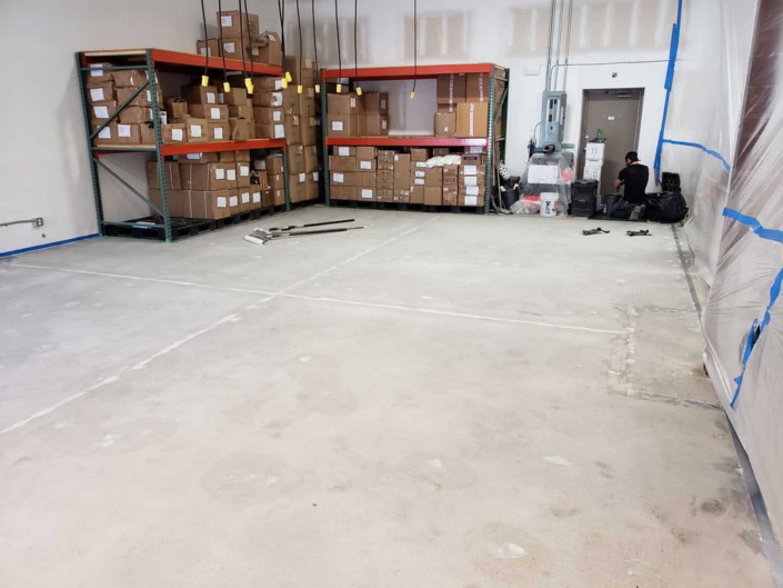 Concrete resurfacing and epoxy floor coating at Jusu Body