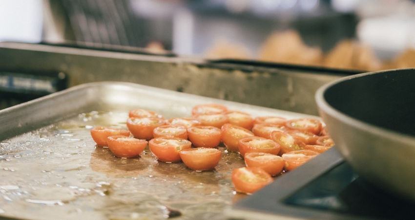 tomatoes cooking in kitchen